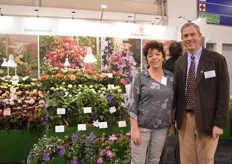 Annette Steinhaven and Ken Rynearson of Poulsen Roser, standing next to their new clematis and potted roses varieties.
