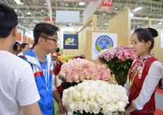Visitors talking about Colombian roses.