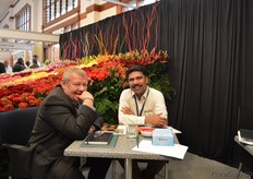 Mohan Choudhery of Black Tulip talking with a visitor.