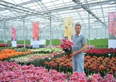 Peter van de Wetering of Lily Looks holding the Sunny Matinique. It is a compact and improved pink oriental.