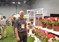 Terry Talsma of Syngenta next to the Caliope geranium series. It is an existing series, but they recently split the series in two; a large series and a medium series. This medium inter specific geranium series is less vigorous. The series has striking colors and the Dark Red is their flagship variety.