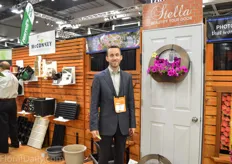 Derek Moeller of McConkey in front of their new doorrief. It allows consumers to decorate their doors with plants and they supply the rief to growers and the retail market. 1 liter plants can be put in it.