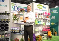 Bret Sulaver of Summit Plastic Company holding the 3D Pot. The name stands for Direction, Dimension and Display.