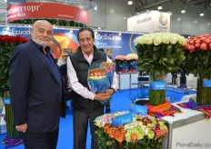 Samuel Shpak of Agriver and Gonzalez Luzuriaga of BellaRosa holding BellaRosa's new flowers; the Fancy (a colored rose) and the Frosty (a rose with glitters on the leaves).