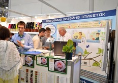 Daniel Grandjean (on the right) of PrinTack talking with visitors.