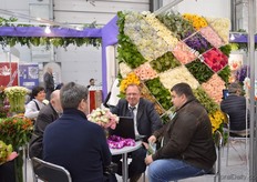 Belyaev Alexander of Vered Flowers talking with visitors.