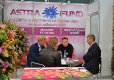 Egidijus Kunigiskis of Astra Fund talking with visitors.