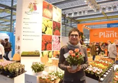 Rosa Eskelund of Roses Forever holding her new orange mini rose. The name will be revealed at the IPM Essen in January 2017.