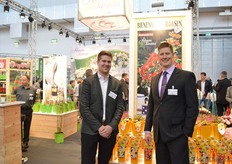 Stepham Heyer and Alexander Letkow of Rosen Tantau in front of the Bienenwiede Rosen. These roses attract bees.