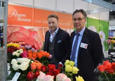 Alexander Brjuhins and Klaus Wolf of Rosen Tantau, a German rose breeder. The white rose on the left, called the Beluga will soon be planted by one of the largest rose growers in Ukraine; Ascania.