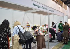 Visitors interested in the bouquets.