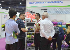 Jose Mantilla of BellaFlor talking with visitors.