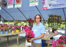Jerome O'Neill of Vista Farms, holding the new bougainvillea Sunstone Red. It is a heavy bloomer and heavy branching.