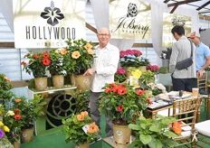 Jim Berry of J. Berry holding the Hibiscus Hollywood Gossip Queen. It is part of the Hollywood collection. This award-winning Hollywood Hibiscus collection is characterized by the vibrant color, long-lasting, multi-day blooms, bud count, and compact growth habit, which makes them good for containers.