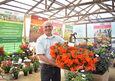 Steve Rinehart of Kientzler holding the Begonia Belleconia Hot Orange. This double flowered begonia is a boliviensis type. According to Rinehart, it will handle the summer heat a bit better than other begonias.