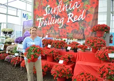 "Delilah Onofrey of Suntory holding the Petunia ‘Surfinia Trailing Red’. Compared to the ‘Surfinia Deep Red,’ this plant is fuller and more vigorous and the flower color is brighter and larger. "This essential red will be perfect in patriotic combinations."