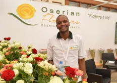 Robert Maina of Oserian. He is one of Oserians florist and created the display at the booth of Oserian.