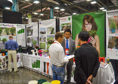 Kazuta from KANEYA company, showing some information to visitors.