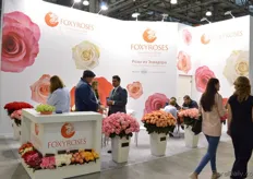 The large and busy booth of Foxy Roses.
