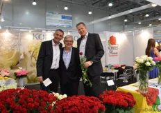 The team of Kordes Roses. Göran Basjes (on the right) is holding the Con Amore, a new red rose variety. In the middle their agent in Russia Vladislav Metelitsa of the company Demetra.