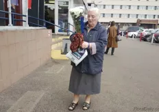 This lady bought some nice chrysanthemums at the Riga market.