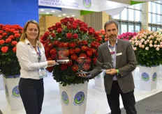 "Olga Perdomo and Michael Vaughan of Grupo Andes Farms holding their awards. They are the Grand Champion among the growers with their rose called Red Eye. This rose also received the first price for "Best in Category". And this all on top of the Acknowledgement award they received from Florverde that morning."