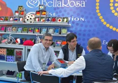 Sergio Illescas Jijón and Santiago Luzuriaga of BellaRosa talking with visitors.