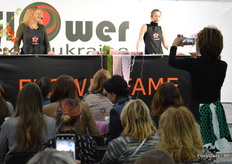 Florists making flower arrangements on stage. These ladies are sponsored by Ductch packaging company Dillewijn Zwapak
