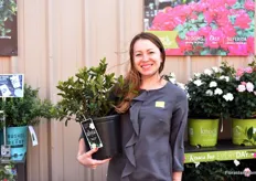 Leah Haugh of Star Roses and Plants holding the Gardenia Jasminoldes. A low maintenance plant that has sugar fragrant flowers.