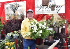 Jim Berry of J. Berry Nursery presenting the Gardena 'Sweetheart'. It is a fragrant variety that naturally grows like this, it may require one pruning.