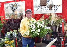 Jim Berry of J. Berry Nursery presenting the Gardena 'Sweetheart'. It is a fragrant variety that naturally grows like this, it may require one pruning.