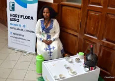 The Ethiopian growers delegation brought this beautiful lady serving a traditional Ethiopian cup of coffee.