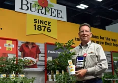 Tim Duffin with Burpee (Ball Horticulture) holding a Hot Pepper plant.