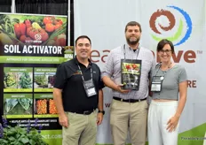 Matt Shanks and Michael Warren, holding a pack of Soil Activator, of Earth Alive with Katie Dubow of Garden Media Group.