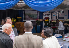 Richard McGonnell, the chairman of the Naivasha Horticultural Fair and Sales Manager at WAC International talking with Nakuru Governor Lee Kinyanjui.