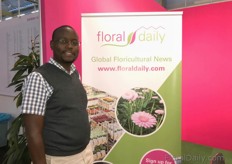 Mr Stanley Musiime with Ugarose Flowers