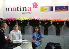 Jorge Ortega of Matina Flowers talking with visitors. 