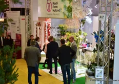 The team of Royal FloraHolland talking with visitors.
