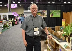 John Sanderson of Cornell University,  professor in entomology, was visiting the booth of fertil.