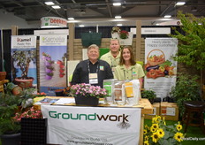 A shared booth of Kamel and Groundwork. On the left Dave Blackford with Kamel and Amenda Tull and John Buck with Groundwork.