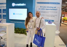 Maria Delgado and George Velez of Komet Sales. According to Velez, Komet Dynamics is a hit; they are bringing artificial intelligence into the flower business.