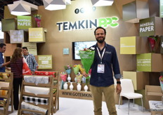 Noam Temkin of Temkin POC presenting one of their environmental friendly sleeves. This sleeve is made from calcium carbonate.