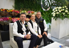Team of Farm Fresh in front of the bouquets made by Mark Frank (sitting on the right).