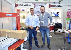 Fredy Rincon and Carlos Rico of Ipack presenting their cardboard binding machine.