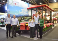 The team of Ayura. This year, they did not bring their donkey to the fair, but a car – which they decorated with their flowers. They grow roses and carnations and won an award for their booth.