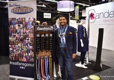 Willie Salavea of Real Fans Go Nuts presenting the Kukui, which means Luck in Hawaiian. These products (neckless made out of nuts) go into the floral department and are mainly sold during the graduation season.