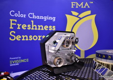 By marrying part of the sticker which is being put on the sleeves to indicate the vase life of the product. 