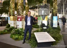 Peter Larsen - Ledet of Floradania with the Sustainability Goals in the back as well as the chair made out of recycled PP Plastic. In their booth, they show how all of the 8 statements of the Danish horticulture industry fit in the 7 Sustainable Development Goals of the UN.