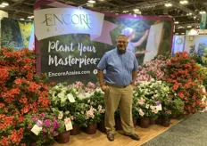 Robert “Buddy” Lee, Director of Plant Innovations for Plant Development Services in front of the Encore Azalea booth