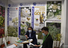 Pawet Marczynski (on the left) busy at work at the Clematis stand.